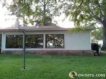 back view. patio and back door to left.