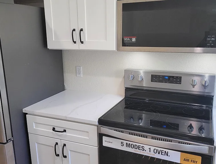 New range and microwave.