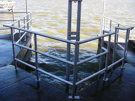 Boat slip with railings