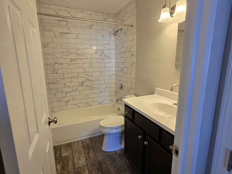 Updated bathroom with ceramic tile.