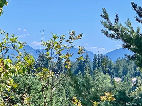 The back of the house features Cascade Mountain views.
