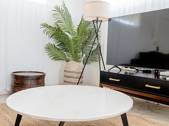 Gather around your cozy living room equipped with high powered air conditioning.