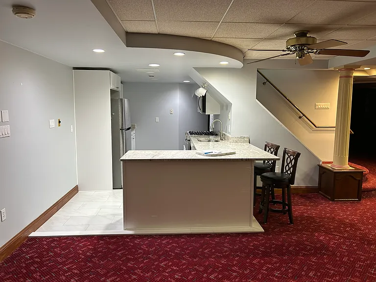 Kitchen as seen from Living/TV room (barstools are include or can be removed)