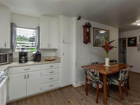 Dining area and portion of kitchen.