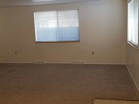 Living room and front door (on right) from dining area