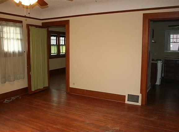 view showes left door bedroom #1 or office, Right is kitchen