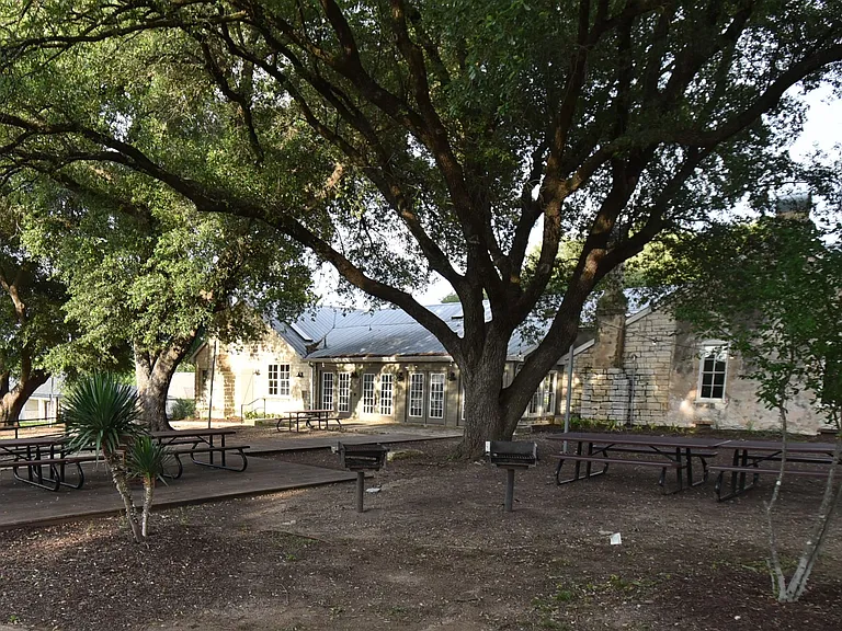 Grills and picnic tables of the community club house
