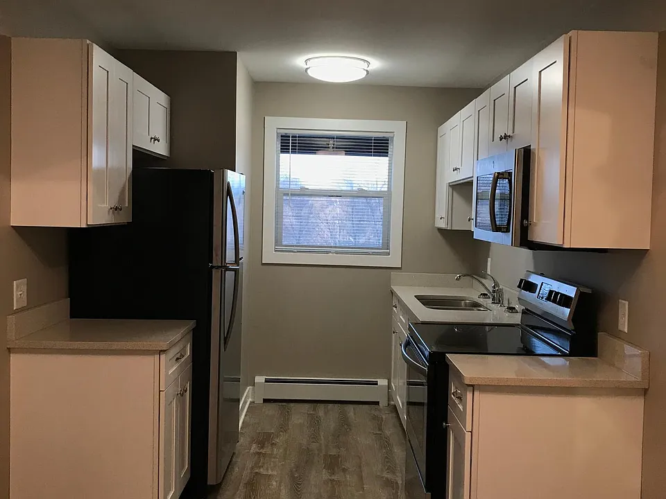 Beautifully updated kitchen with stainless steel appliances and granite counter tops.