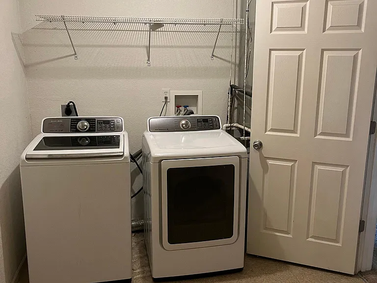 Laundry room upstairs, washer and dryer included