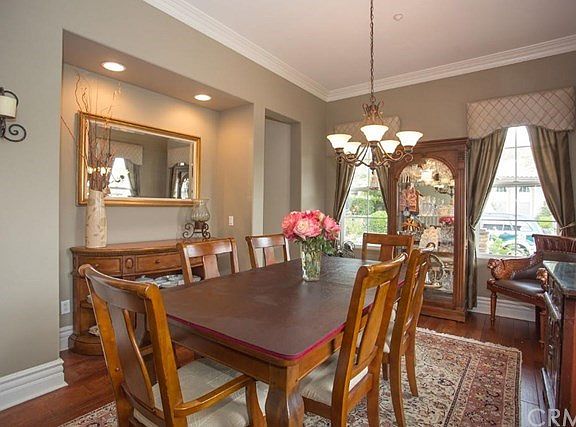 Formal dining room at front entry of home. Butler's pantry and laundry room connect it to the kitche