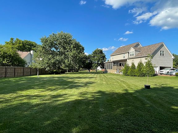 backyard with above ground fence and underground dog fence around the whole house