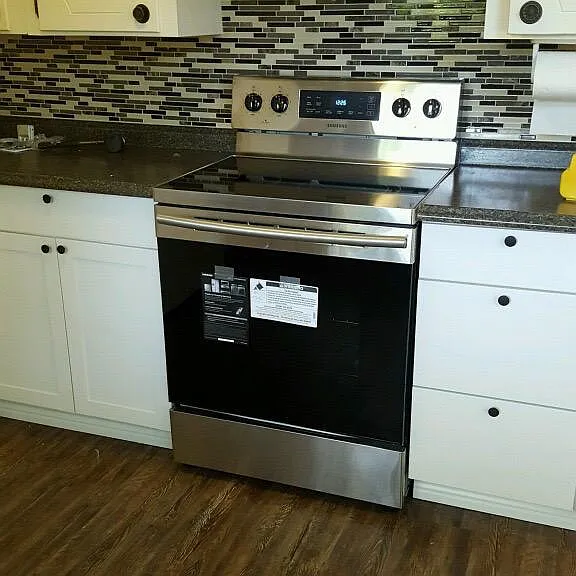 New stove, counters and cabinets