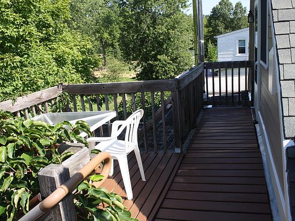 2nd floor walkway and deck (table and chairs included)
