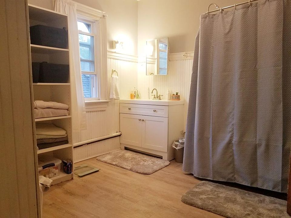 Huge bathroom with new flooring and vanity