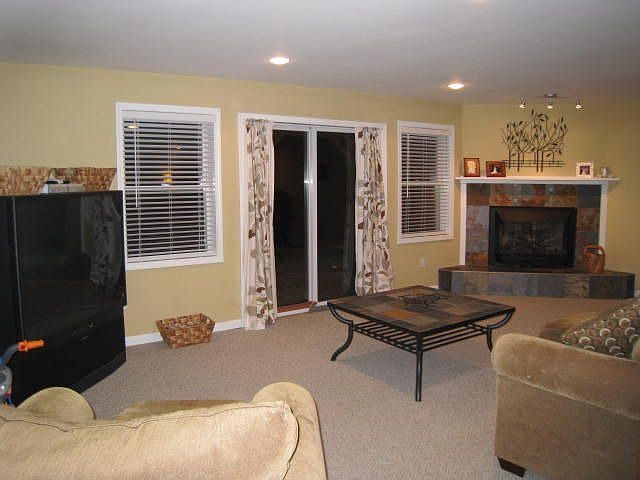 family room with slate fireplace
