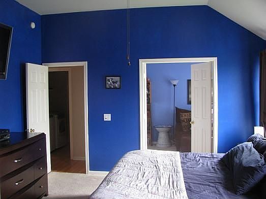 grand master suite with large bathroom and sitting room