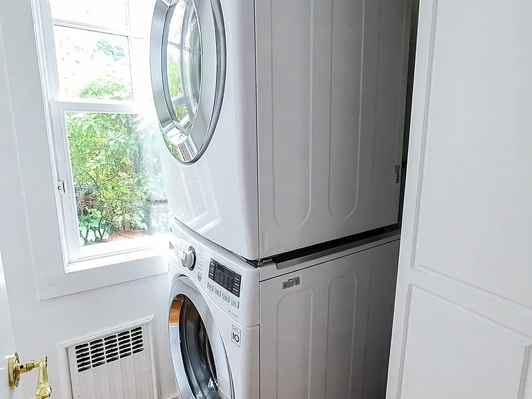 Stacked laundry on main level.