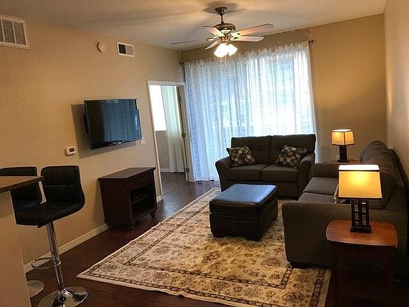 Spacious living room with 52' Samsung smart TV