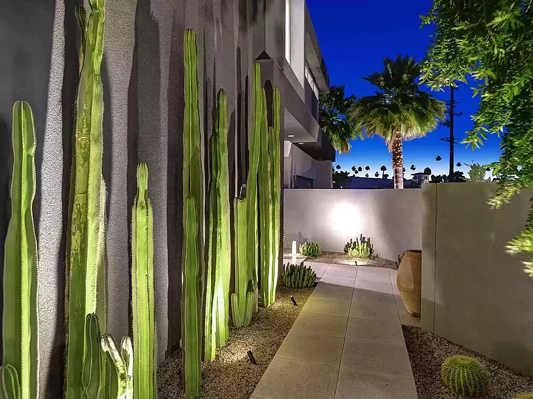 Pathway to front door at night.
