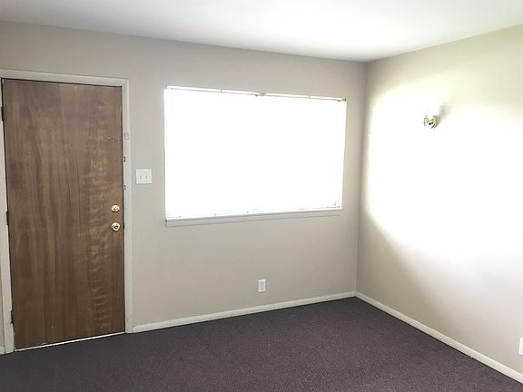 Bedroom. Door in bedroom leads out to rear balcony