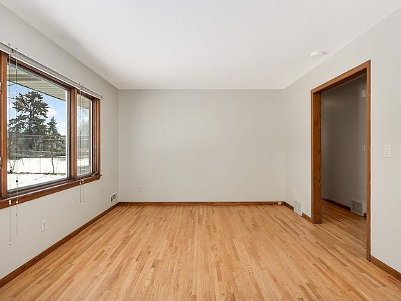 Living Room with view of hallway leading to bedrooms.