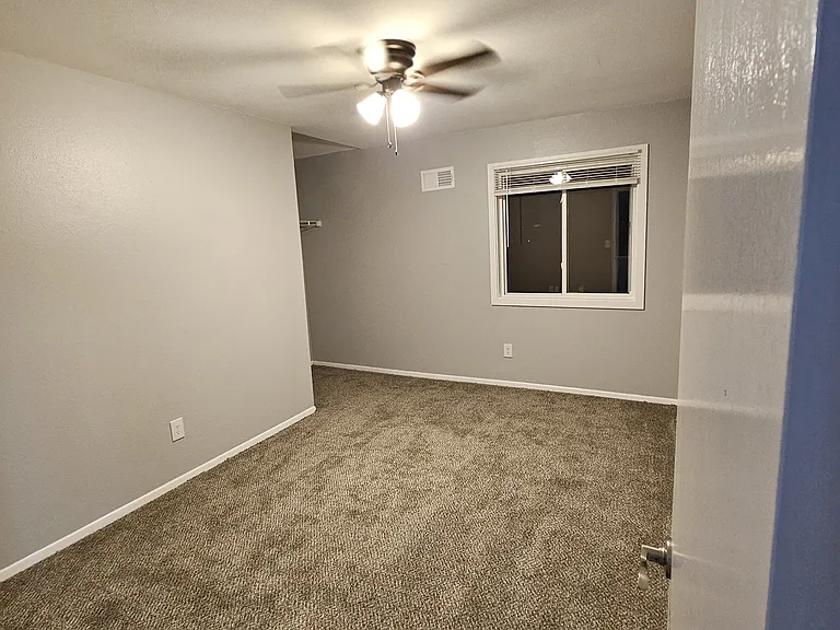 The carpet was removed. The hardwood floors under are solid but damaged.