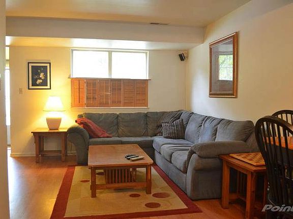 Living room with wood laminate floor.