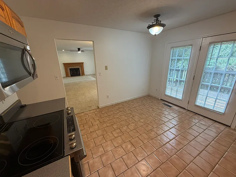 Kitchen with door to deck