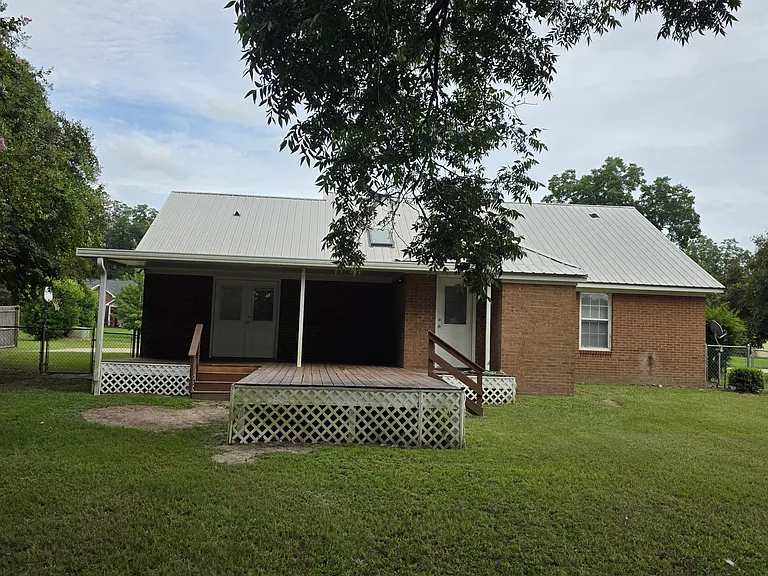 large covered back porch and deck