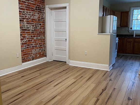Dining room view towards bathroom on the left and kitchen on the right from Center Hall