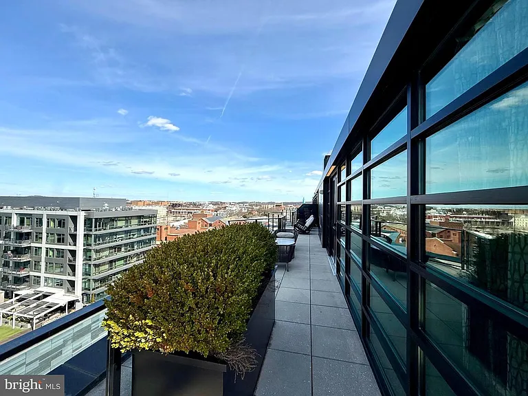 Rooftop terrace with premium grilling station and lounge
