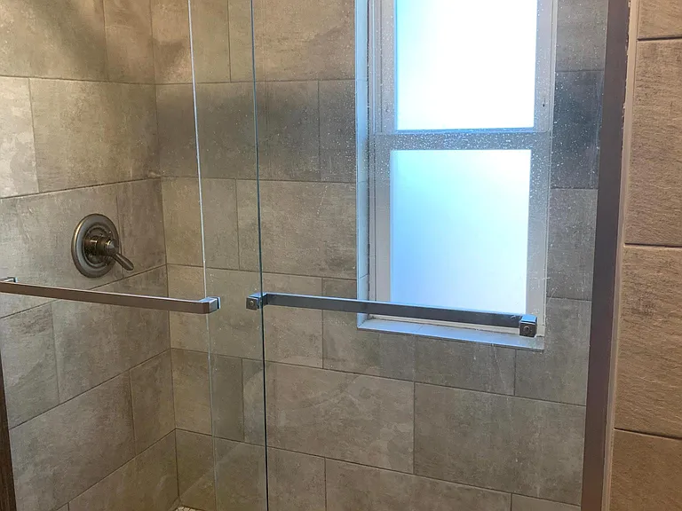 Updated master bathroom with walk-in shower