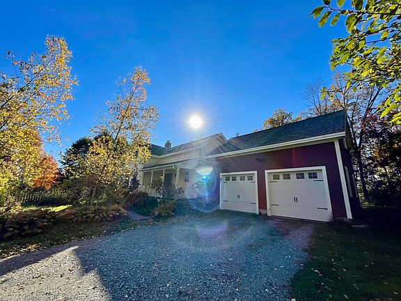 Driveway, 2 car garage, side entrance