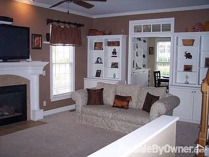 Living Room into Office
						:
						Pass through with double glass paned pocket doors.