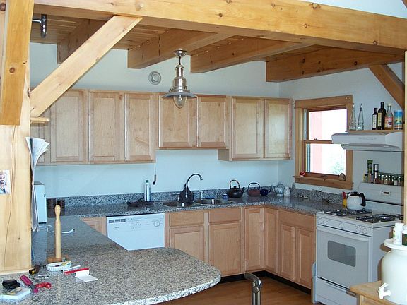 Maple Cabinets and Gleaming Hardwood Floors