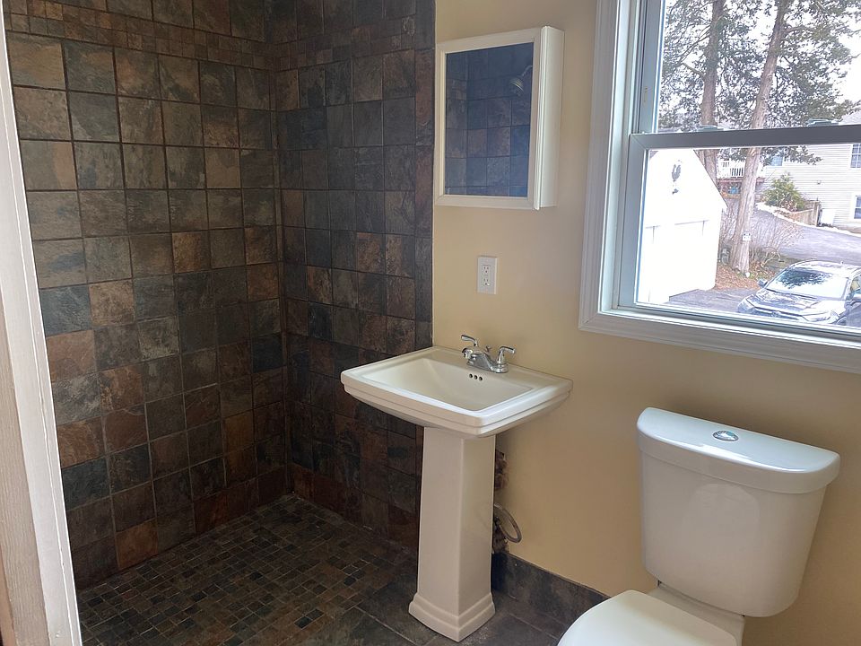 bathroom with walk in shower.