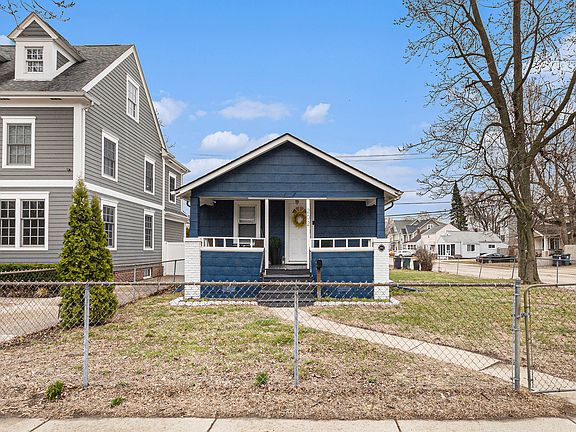 Fenced yard with a large covered porch. Great for relaxing.