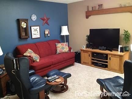 Family Room
						:
						This is an open concept room off kitchen in back of house for extra privacy.