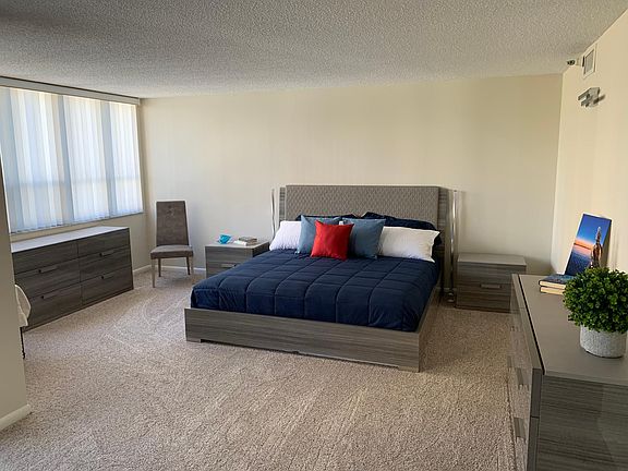 Large Master Bedroom. King Sized bed. Double dressers. Walk-in closet and bath.