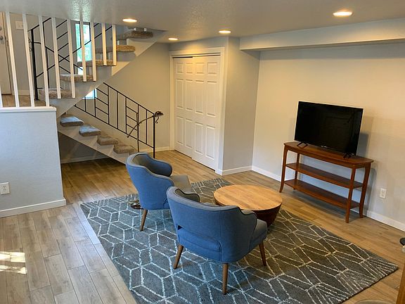 Living room looking toward stairs/entry