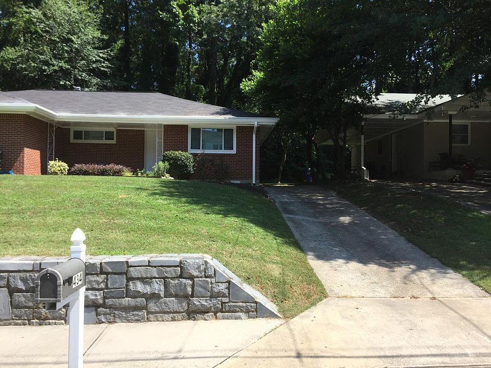 Front of property with personal driveway