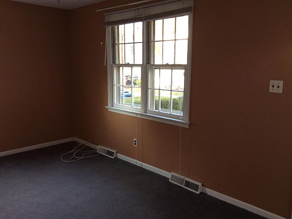 Living room looking at front windows.