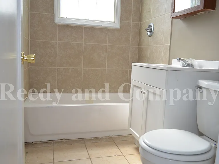 First Month Free; Adorable Duplex In Crosstown Area! — Photo 9