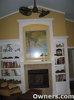 Living Room w/fireplace & cathedral ceiling