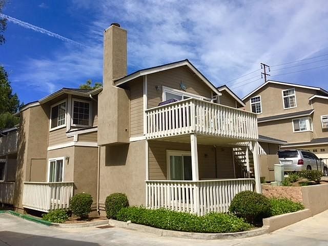 Tri Level townhome with 3 decks attached.