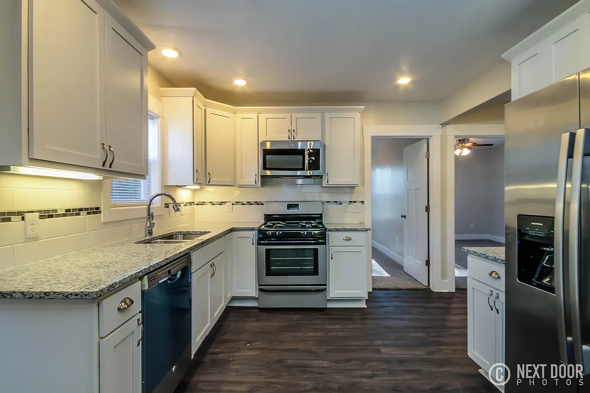 All new kitchens, granite, stainless - 112 Gunnison Ave SW