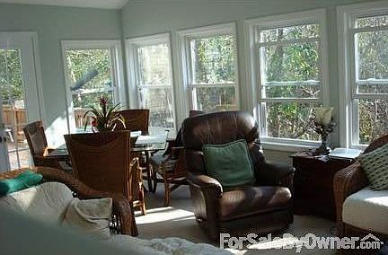 Sunroom : Sunroom overlooks wooded conservation area. Surround Sound.