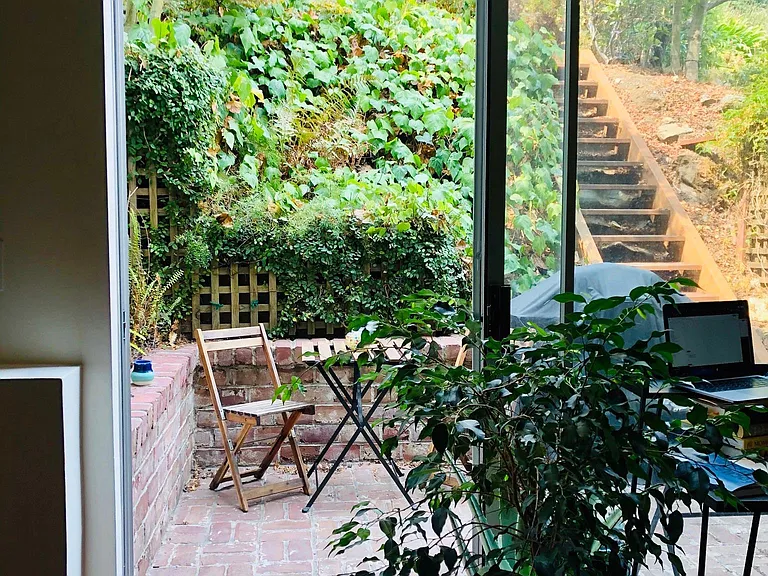 Private patio with stairs to upper garden