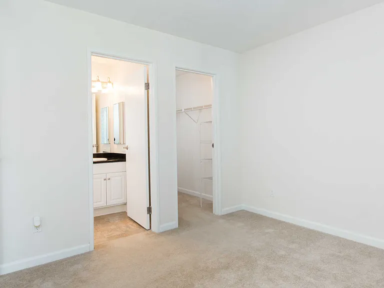 Bedroom with On-Suite Bathroom and Walk-In Closet