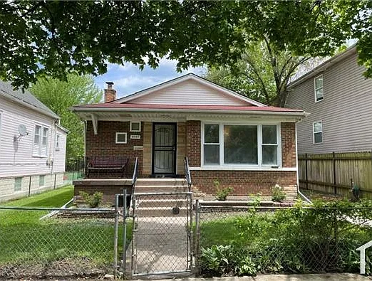 9049 S Ellis Ave — Photo 1